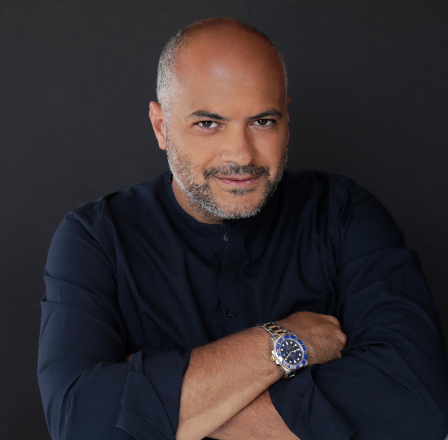 Gaston Rivero portrait with arms crossed